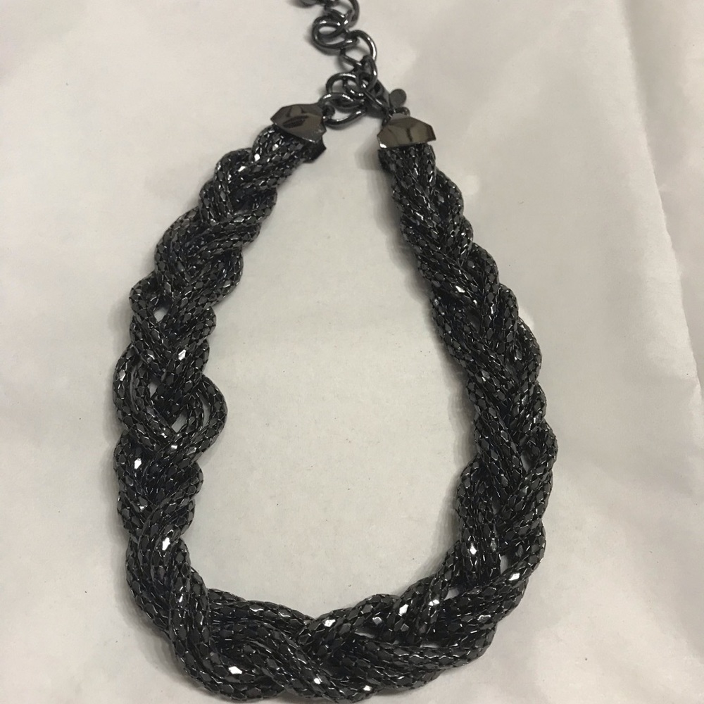 Black braided necklace.